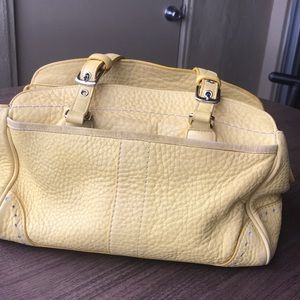 Yellow Leather Coach bag.